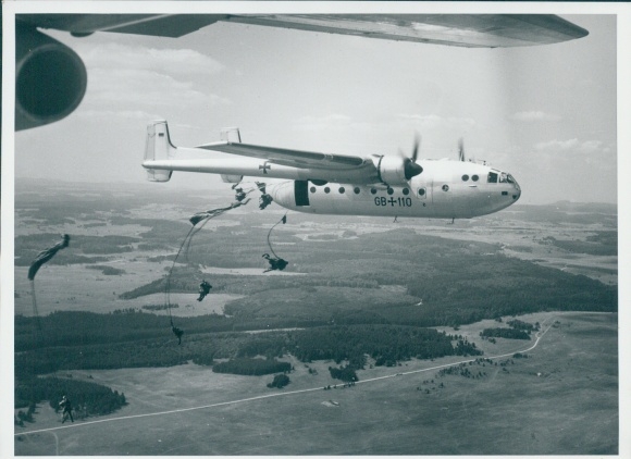 Photo German military aircraft, parachutist during the jump, Bundeswehr, Luftwaffe, GB 110