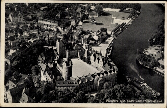 Postcard Bernburg an der Saale, aerial photograph of the town, castle