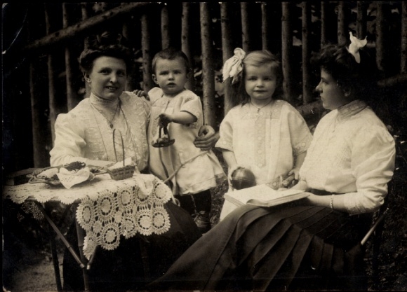 Postcard Kostebrau Lauchhammer in Lower Lusatia, a black and white photograph showing three women...