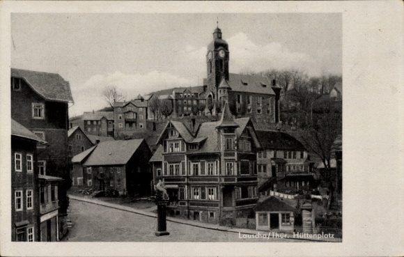 Ak Lauscha in Thüringen , Hüttenplatz, Stadtansicht, alte Häuser, Uhrturm