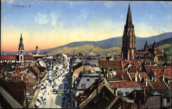 Ak Freiburg im Breisgau, Stadtansicht von  Berge im Hintergrund,  Gebäude