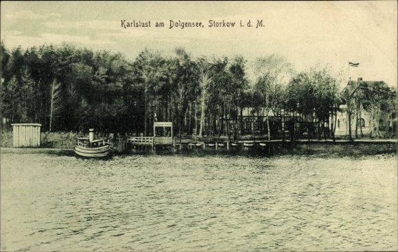 Postcard Storkow in der Mark, Karlslust am Dolgensee, boat in the water, forest area, building
