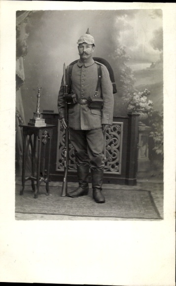 Photo Postcard Landshut in Lower Bavaria, German soldier in uniform, field gray