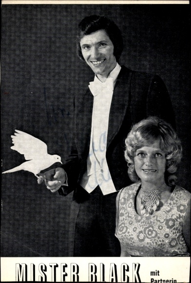 Photo Mister Black with partner, magic, autograph