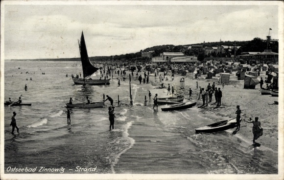 Postcard Ostseebad Zinnowitz on Usedom, Baltic Sea resort beach, sailing ship on the shore, many people on the beach...
