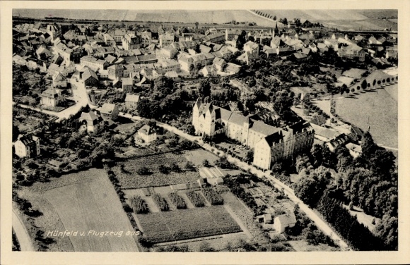 Ak Hünfeld in Hessen, luchtfoto van stadsgezicht, landbouwgebieden, gebouwen