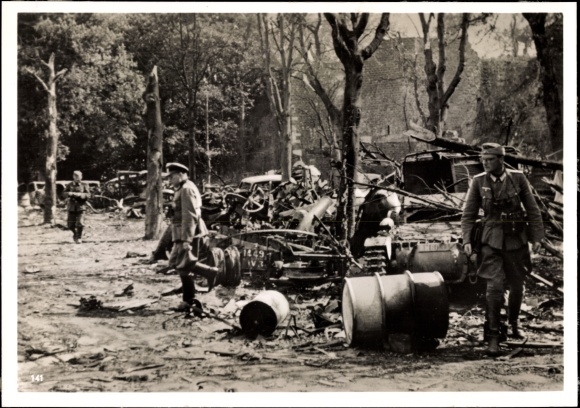 Photo Shot-up war equipment in front of the citadel of Boulogne, Wehrmacht soldiers. June 1940