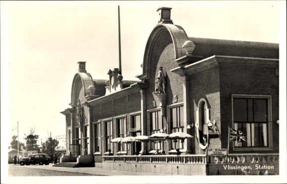 PC Vlissingen Zeeland Netherlands, station, inn, terrace, flag