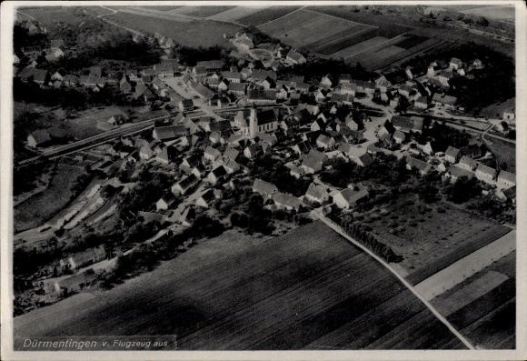Postcard Dürmentingen in Württemberg, aerial photograph, village view, numerous houses, church, agricultural
