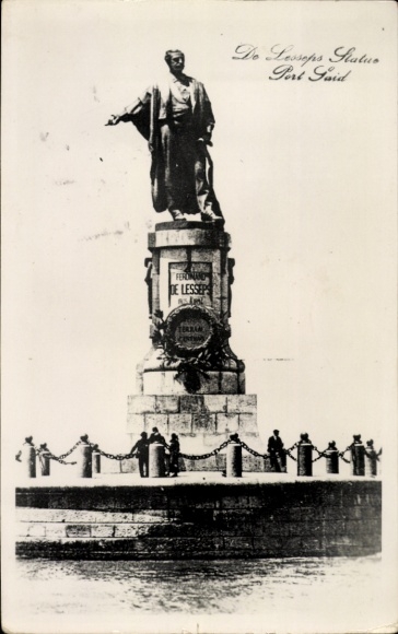 Postcard Port Said Egypt, statue of Ferdinand de Lesseps, people around the statue