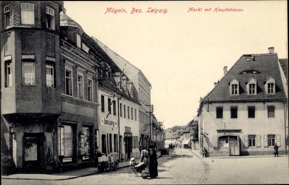 Postcard Mügeln in Saxony, market with main street, shops