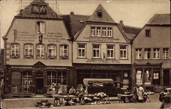 Postcard Sankt Wendel Saarland, houses with confessions on the cathedral square, market stalls