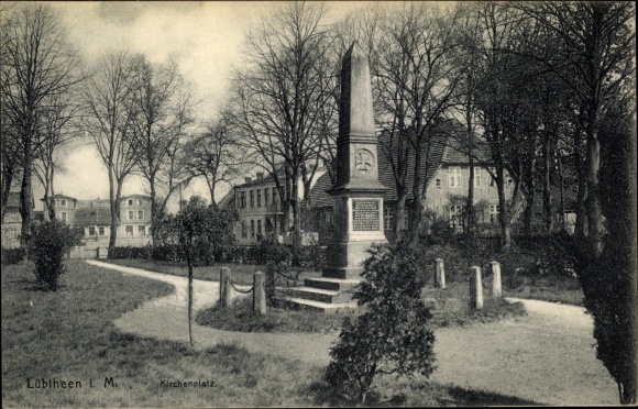 Postcard Lübtheen in Mecklenburg, church square, war memorial