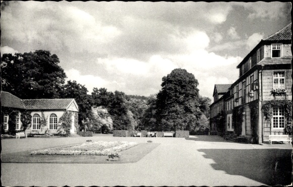 Postcard Bad Driburg in Westphalia, spa park, buildings, trees, lawn, clouds