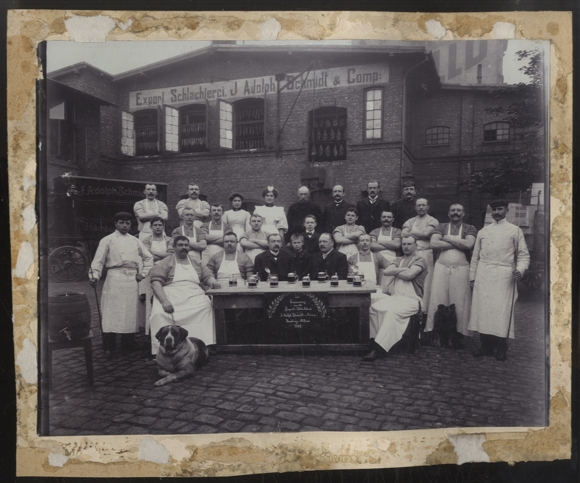 Photography group photo, export slaughterhouse J. Adolph Schmidt & Co., staff, St. Bernard
