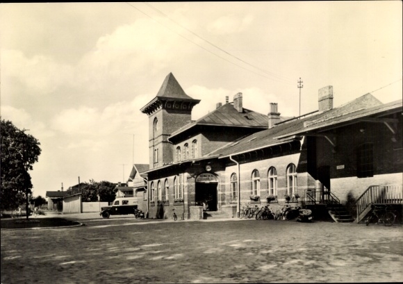 Postcard Putbus on the island of Rügen, train station, historic building, bicycles, sky