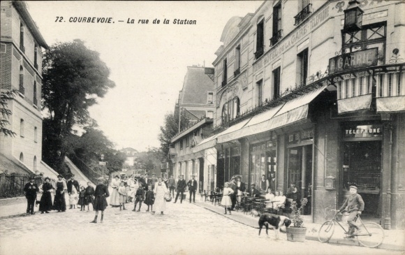 Postcard Courbevoie Hauts de Seine, La rue de la Station, Telephone, Man with a Bicycle