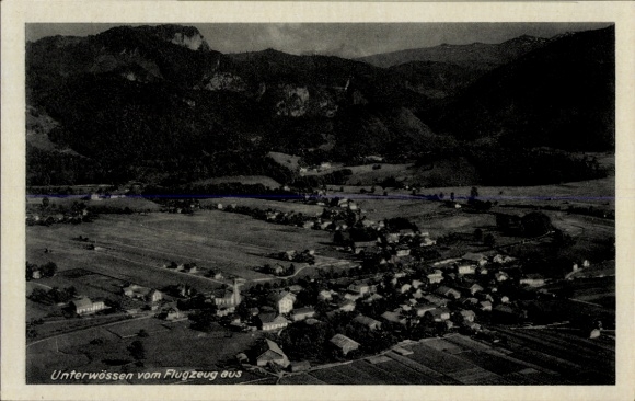 Postcard Unterwössen in Upper Bavaria, aerial photograph, mountain landscape, small village, buildings