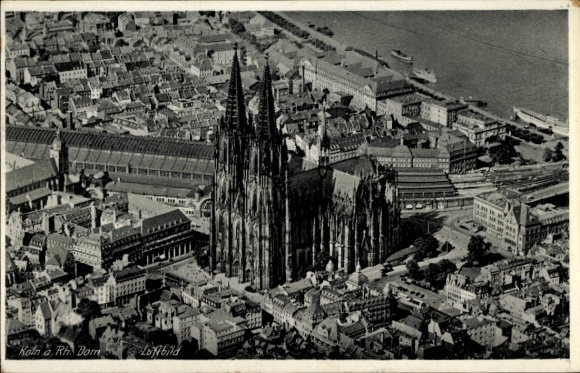 Ak Köln am Rhein, Teilansicht vom Ort, Dom, Bahnhof, Fliegeraufnahme