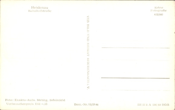 Ak Heidenau in Saksen, straat met auto's, winkels, mensen, wolken, architectuur