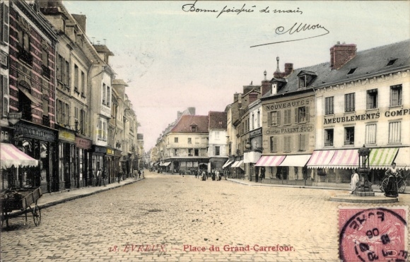 PC Évreux Eure, street with shops, colorful awnings, from Evreux