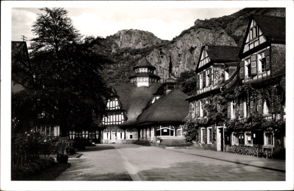 Ak Bad Münster am Stein Ebernburg, straatgedeelte, vakwerkhuizen, rotsen