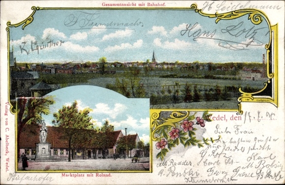 Ak Wedel an der Elbe, Totalansicht der Ortschaft mit Bahnhof, Marktplatz mit Roland