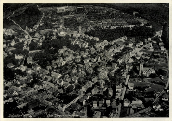 Postcard Betzdorf an der Sieg, aerial view of houses, church, streets