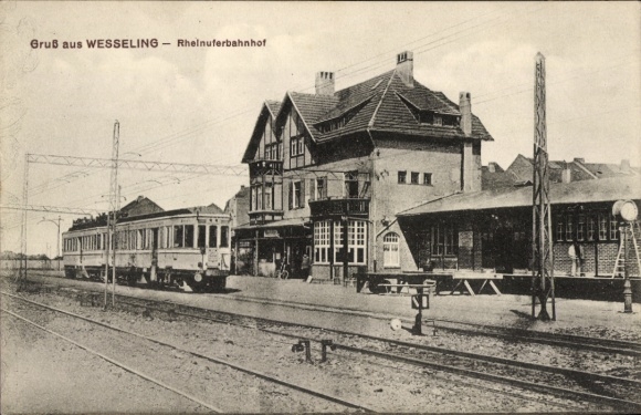 Ak Wesseling am Rhein, Rheinuferbahnhof, Gleisseite, Straßenbahn
