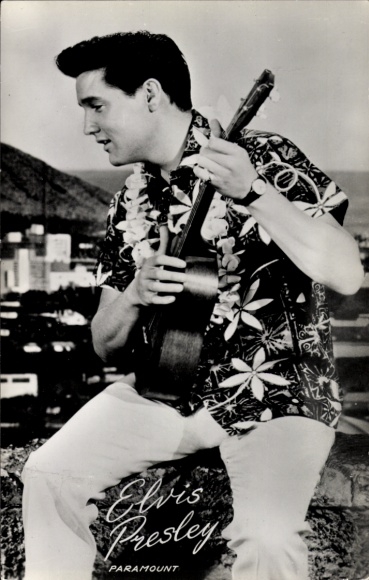 Piosenkarz i aktor Elvis Presley, portret, scena z filmu Blue Hawaii