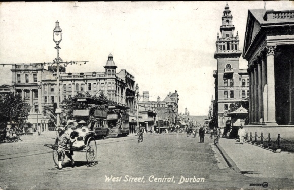 Ak Durban Südafrika, West Street, Central, Straßenansicht,  Tram, Gebäude