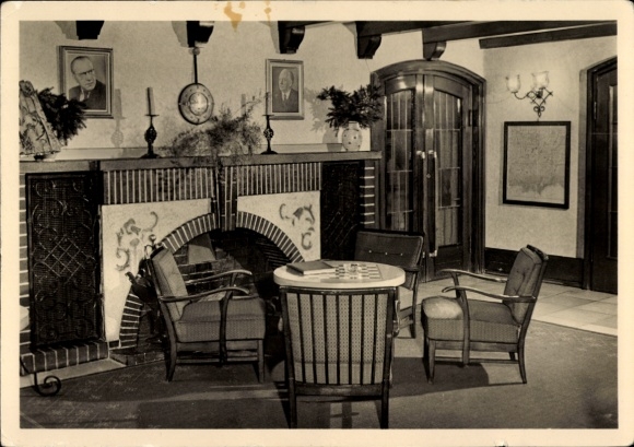 PC Carlsfeld Eibenstock in the Ore Mountains, cozy room, fireplace, table, chairs, portraits at the...