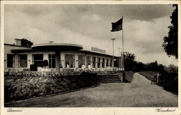 Postcard Dessau in Saxony-Anhalt, Kornhaus, restaurant, terrace, flag, bicycle