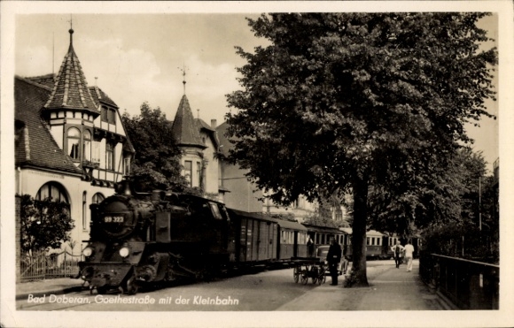 Postcard Bad Doberan in Mecklenburg, Goethestraße with narrow-gauge railway Molli, steam locomotive 99 323