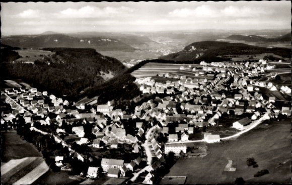Postcard Meßstetten in the Zollernalb district, partial view, road section, mountains