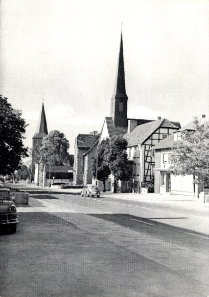 Postcard Anröchte in Westphalia, main street, church towers, half-timbered house