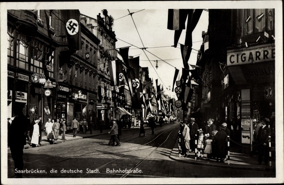 PC Saarbrücken in Saarland, Bahnhofstrasse in flag decorations, cigar shop