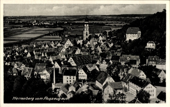 Ak Herrenberg in Württemberg, Luftaufnahme von  viele Dächer, Kirche, ländliche Umgebung