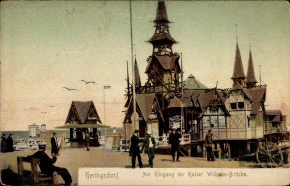 Postcard Ostseebad Heringsdorf on Usedom, at the entrance of the Kaiser Wilhelm Bridge