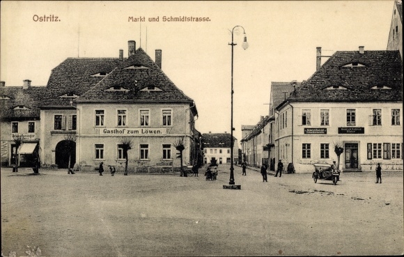 Ak Ostritz in der Oberlausitz, Markt und Schmidtstraße, Gasthaus zum Löwen, Maler Heinrich Lichtner