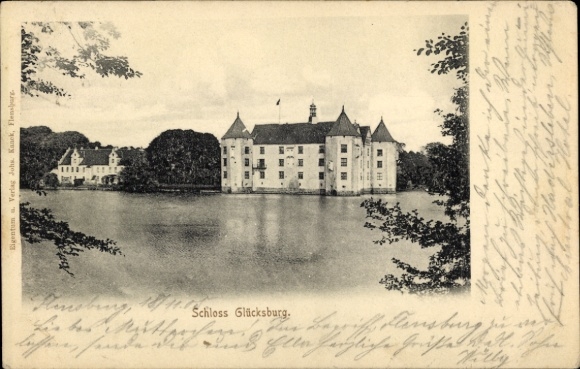 Postcard Glücksburg on the Baltic Sea, Wasserburg Castle, majestic architecture, surrounded by trees