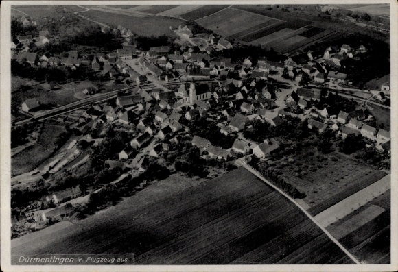 Postcard Dürmentingen in Württemberg, aerial view of numerous houses, church in the center