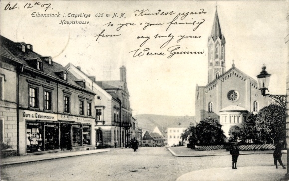 Postcard Eibenstock in the Ore Mountains Saxony, main street, church, shop