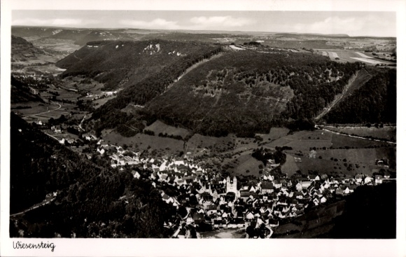 Picture of Wiesensteig in Württemberg, Black Forest landscape, view of houses, church, dramatic mountains