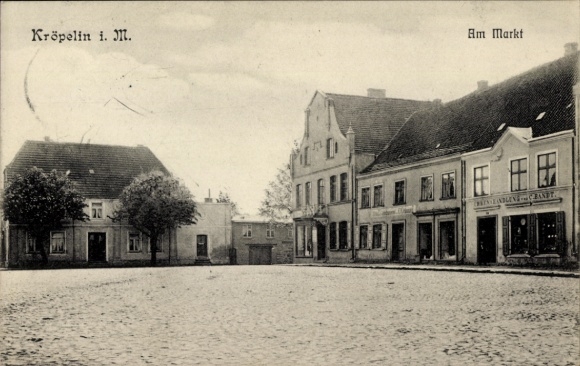 Postcard Kröpelin in Mecklenburg, at the market, shop C. Bandt