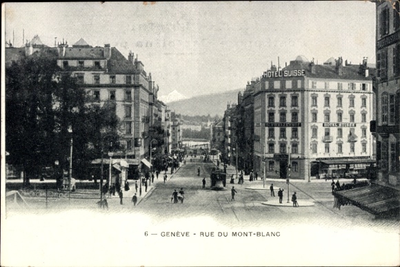KP Genewa, Szwajcaria, Hotel Suisse, Rue du Mont-Blanc, ludzie na ulicy, góra w tle