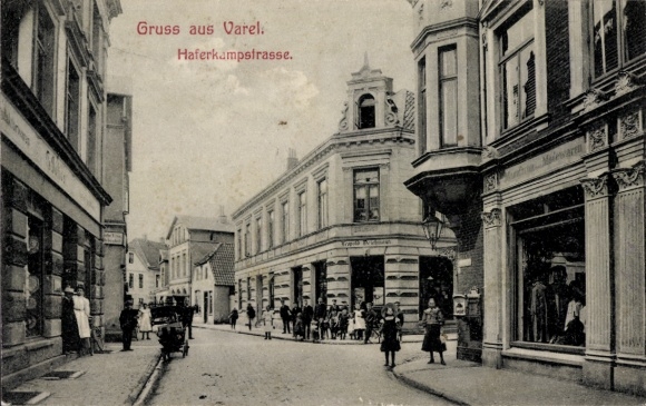 Postcard Varel am Jadebusen, Haferkampstraße, street section, manufactured and fashion goods