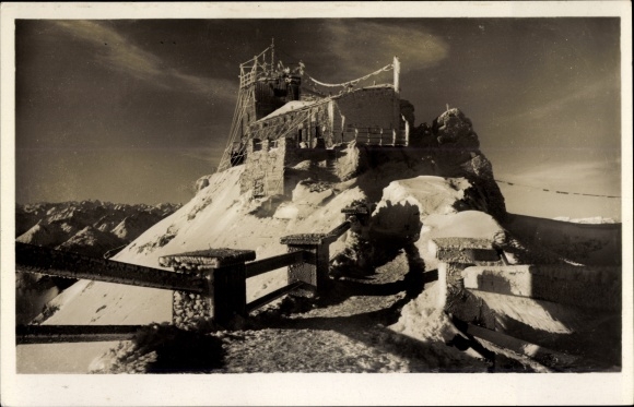 Postcard Zugspitze, view from the summit station of the Bavarian Zugspitzbahn to the Munich house