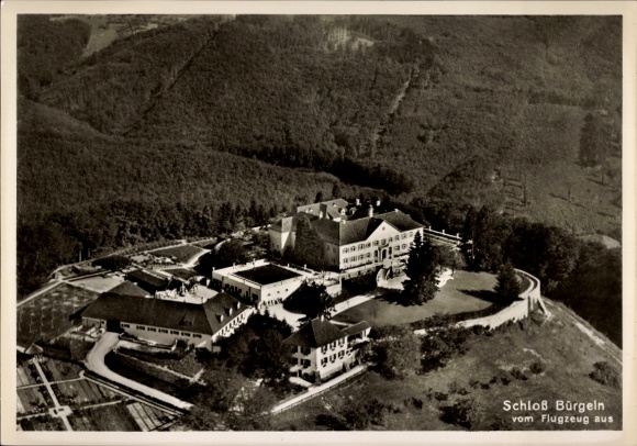 Postcard Bürgeln Cölbe in Hesse, aerial view of the castle surrounded by forests and gardens