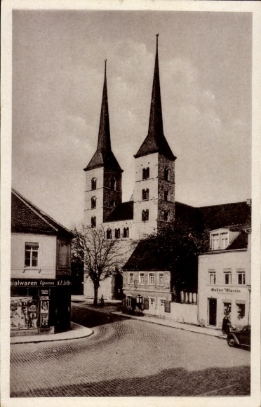 Ansichtkaart Grimma Saksen, Frauenkirche, koloniale goederen KF Seifer, loodgieter Gustav Martin
